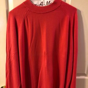 Pink long sleeved mock neck sweater